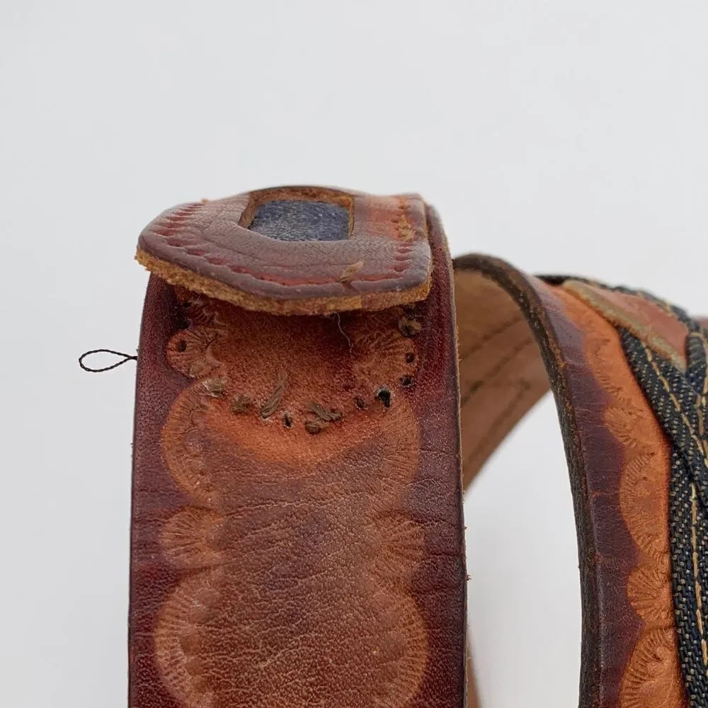 Brown Leather western style belt with braided leather and denim.
